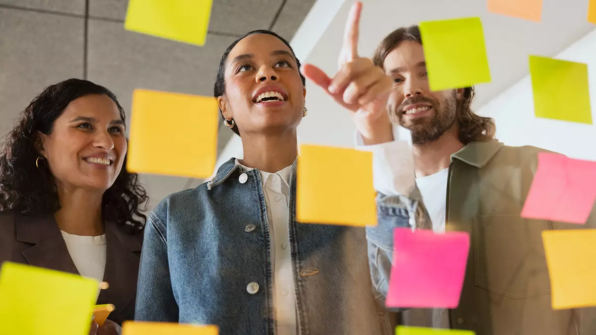 People viewing post-it notes
