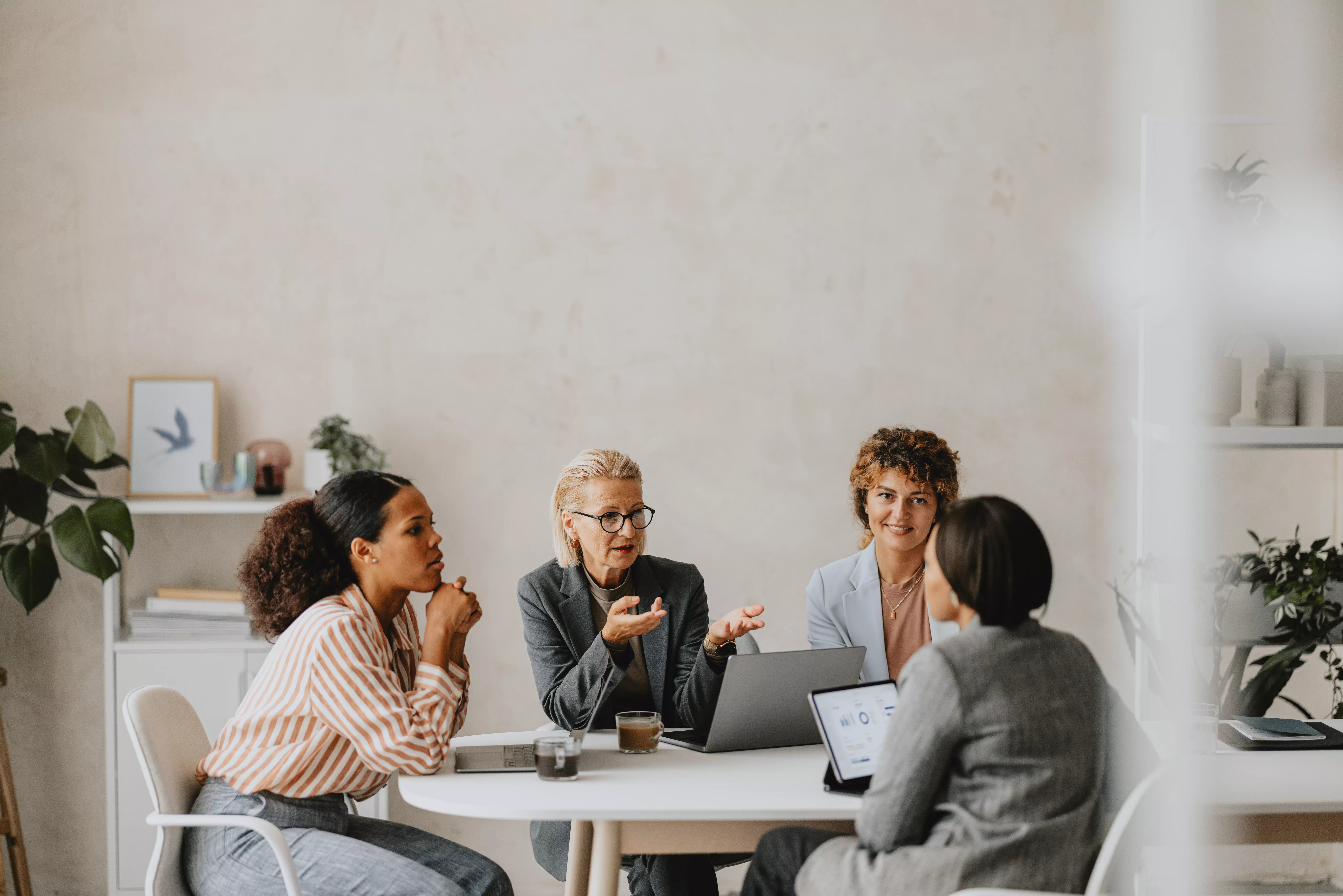 Picture of people talking around round table