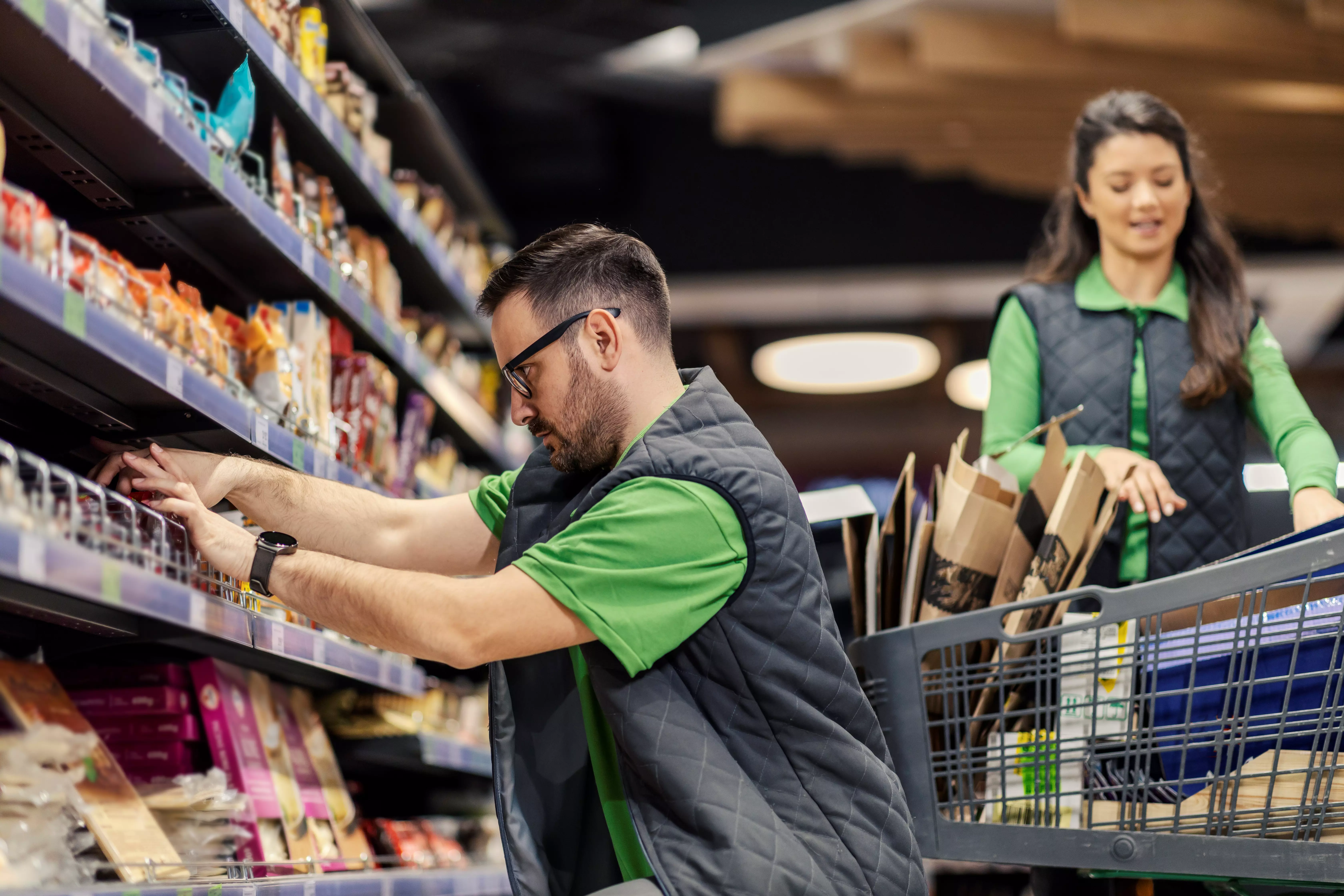 A picture of people working in a grocery store