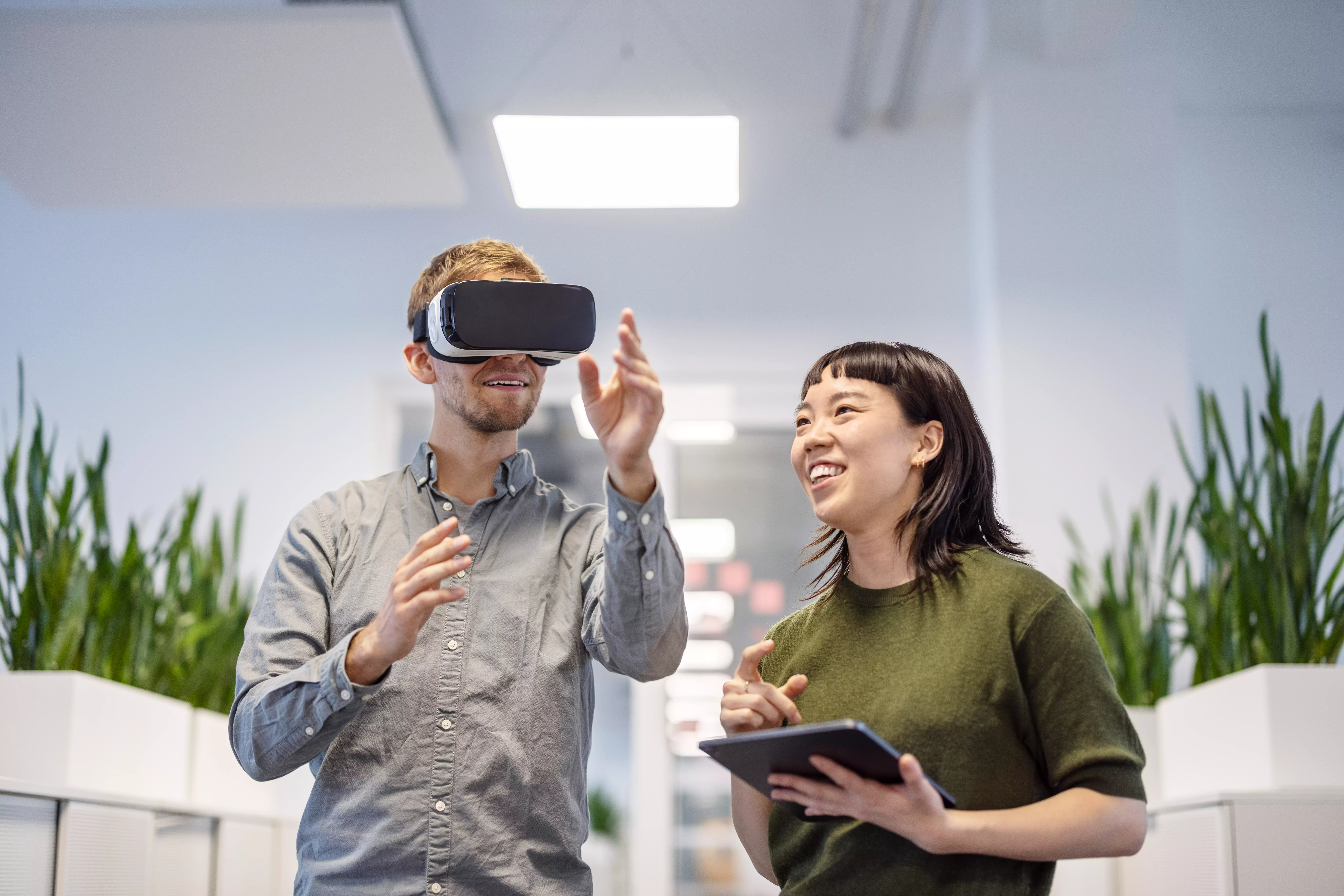 A picture of two people with VR headset