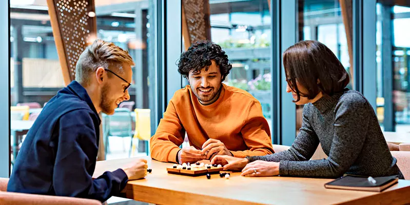 Three people at the table