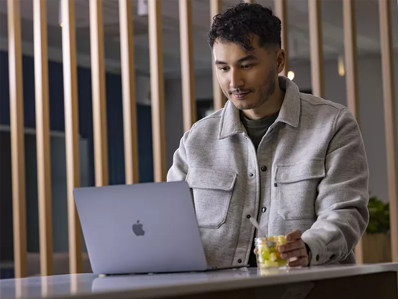 Person looking at a laptop