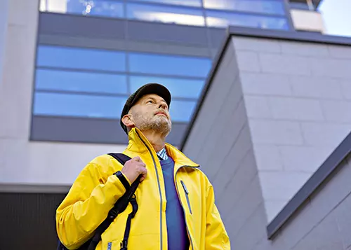 A man looks up at the sky