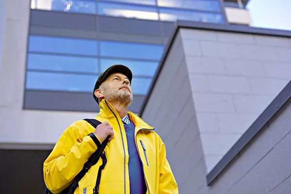 A man looks at the sky